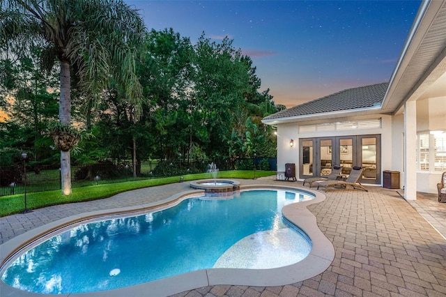 3316 Regal Crest Dr, Longwood, FL 32779 - view of pool featuring a patio, a pool with connected hot tub, and french doors