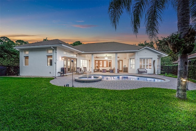 3316 Regal Crest Dr, Longwood, FL 32779 - rear view of property featuring french doors, ceiling fan, an outdoor hangout area, a patio area, and a tile roof