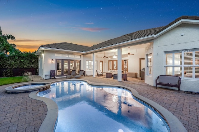 3316 Regal Crest Dr, Longwood, FL 32779 - view of swimming pool featuring french doors, an outdoor living space, ceiling fan, a patio, and a pool with connected hot tub