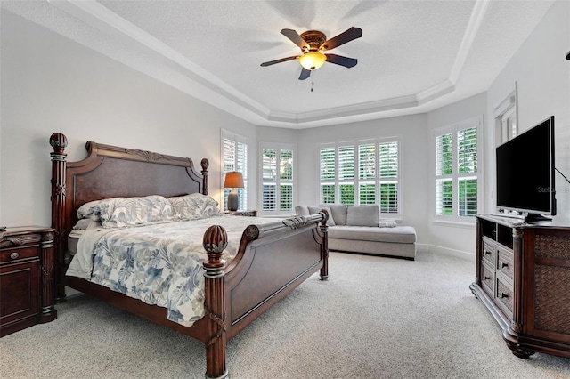 3316 Regal Crest Dr, Longwood, FL 32779 - bedroom featuring a tray ceiling, carpet flooring, and a ceiling fan