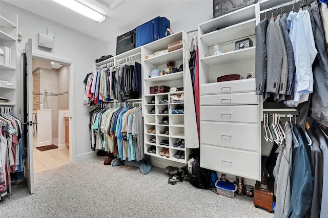 3316 Regal Crest Dr, Longwood, FL 32779 - walk in closet featuring carpet flooring, tile patterned flooring, and attic access
