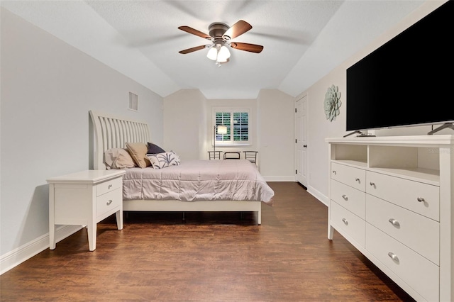 3316 Regal Crest Dr, Longwood, FL 32779 - bedroom featuring vaulted ceiling, dark wood finished floors, and a ceiling fan