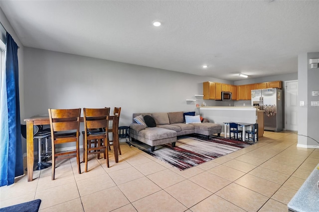 509 Cresting Oak Cir Unit 73, Orlando, FL 32824 - living area featuring light tile patterned floors and recessed lighting