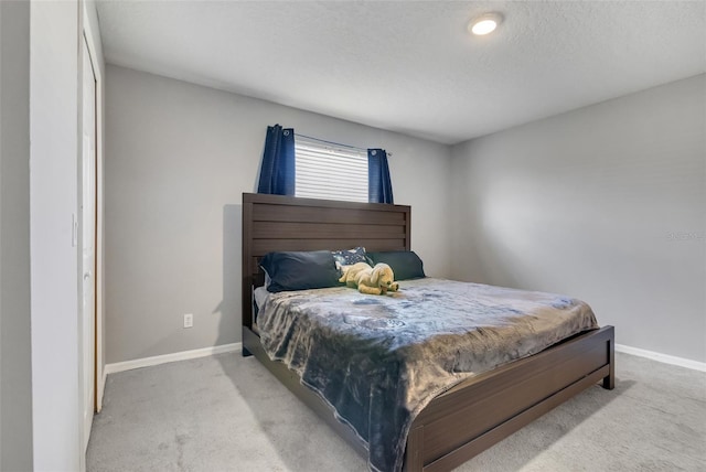 509 Cresting Oak Cir Unit 73, Orlando, FL 32824 - bedroom featuring light colored carpet and baseboards