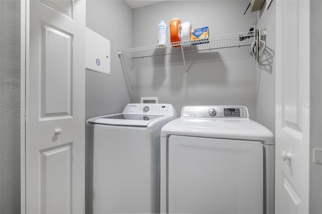 509 Cresting Oak Cir Unit 73, Orlando, FL 32824 - laundry room with washing machine and clothes dryer