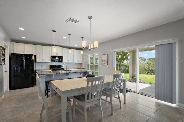 1292 Cavender Creek Rd, Minneola, FL 34715 - dining room with recessed lighting and light tile patterned floors