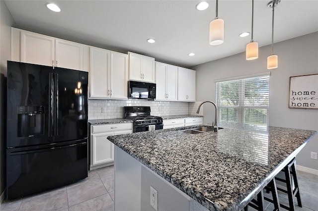 1292 Cavender Creek Rd, Minneola, FL 34715 - kitchen with black appliances, recessed lighting, backsplash, light tile patterned floors, and white cabinets