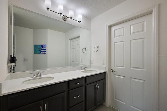 1292 Cavender Creek Rd, Minneola, FL 34715 - bathroom featuring double vanity and a textured ceiling