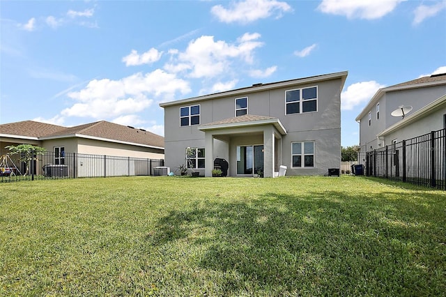 1292 Cavender Creek Rd, Minneola, FL 34715 - back of property featuring stucco siding and a fenced backyard