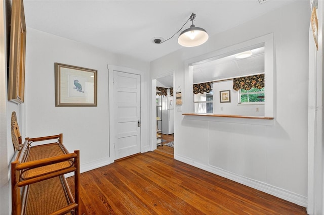 815 E 11th Ave, Mount Dora, FL 32757 - corridor featuring dark wood-type flooring and baseboards