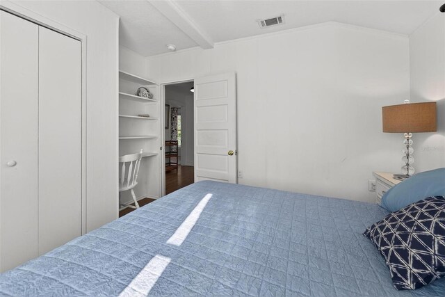 815 E 11th Ave, Mount Dora, FL 32757 - bedroom featuring beamed ceiling