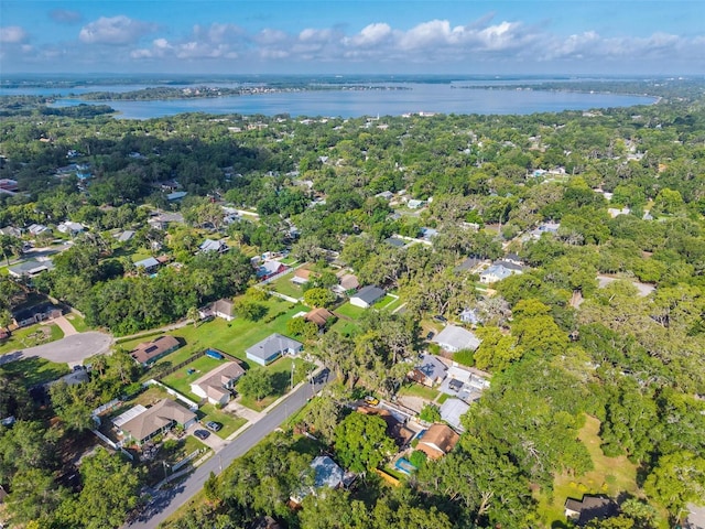 815 E 11th Ave, Mount Dora, FL 32757 - aerial view of property and surrounding area with a nearby body of water and nearby suburban area