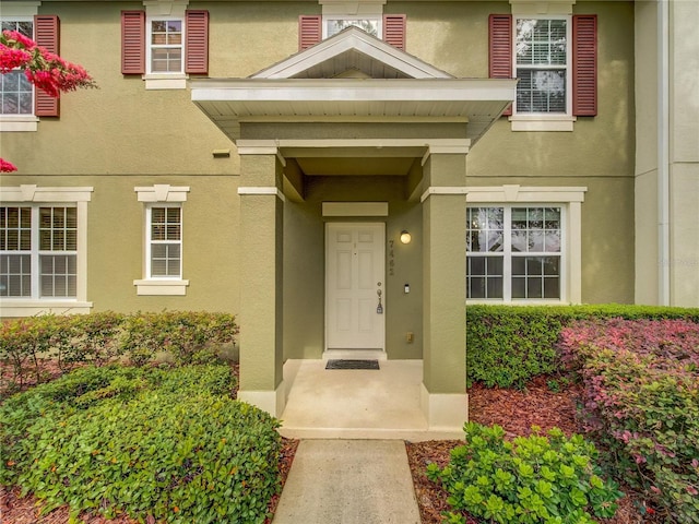 7462 Bentonshire Ave, Windermere, FL 34786 - property entrance with stucco siding