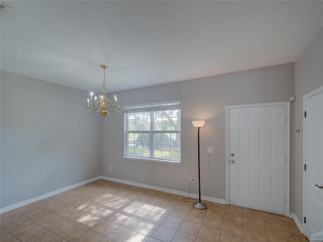 7462 Bentonshire Ave, Windermere, FL 34786 - foyer entrance with a chandelier and light tile patterned floors