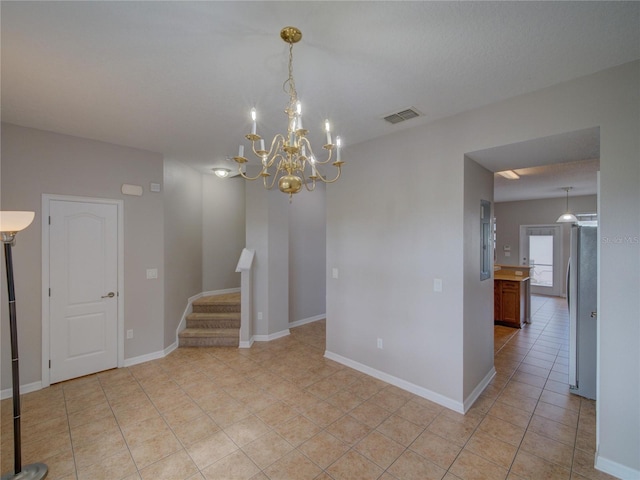 7462 Bentonshire Ave, Windermere, FL 34786 - unfurnished room with light tile patterned floors, stairway, and a chandelier