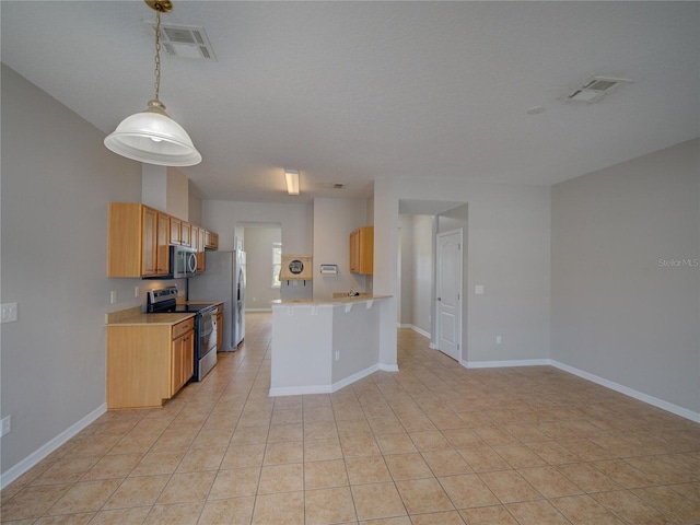 7462 Bentonshire Ave, Windermere, FL 34786 - kitchen with stainless steel appliances, light countertops, light tile patterned floors, open floor plan, and decorative light fixtures