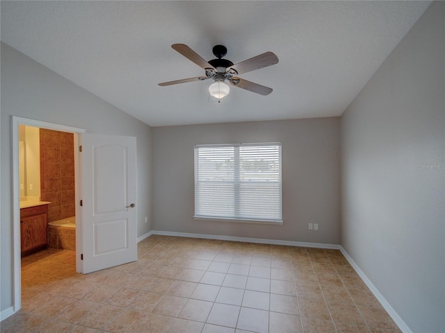 7462 Bentonshire Ave, Windermere, FL 34786 - empty room featuring light tile patterned floors, ceiling fan, and lofted ceiling