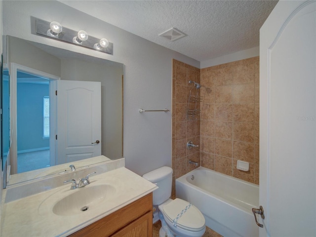 7462 Bentonshire Ave, Windermere, FL 34786 - bathroom with vanity, shower / bath combination, and a textured ceiling
