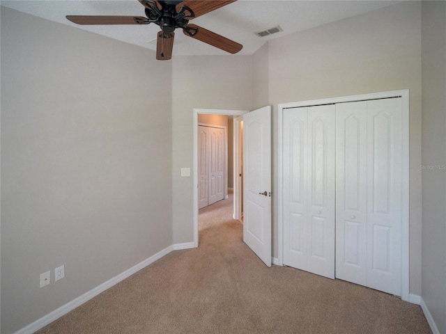 7462 Bentonshire Ave, Windermere, FL 34786 - unfurnished bedroom featuring carpet, a closet, and a ceiling fan