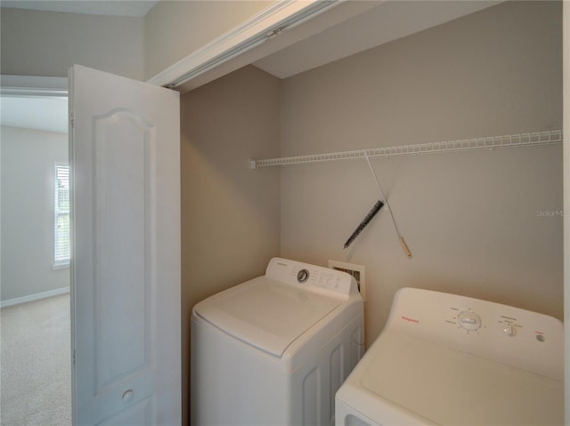 7462 Bentonshire Ave, Windermere, FL 34786 - laundry room featuring separate washer and dryer and carpet flooring