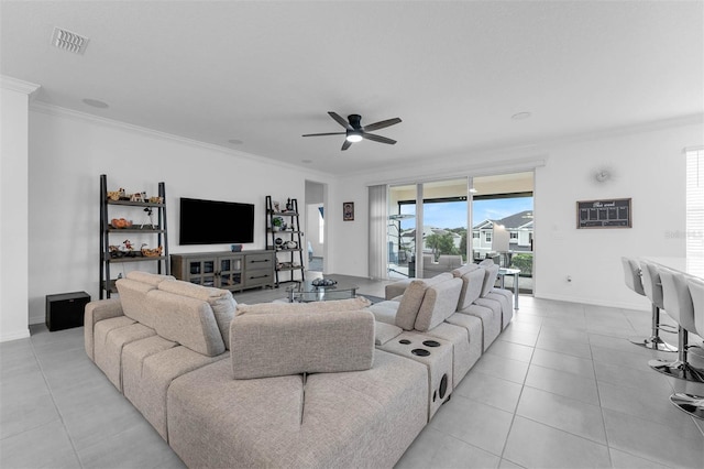 1593 Osprey View Dr, Apopka, FL 32703 - living room with a ceiling fan, ornamental molding, and light tile patterned floors