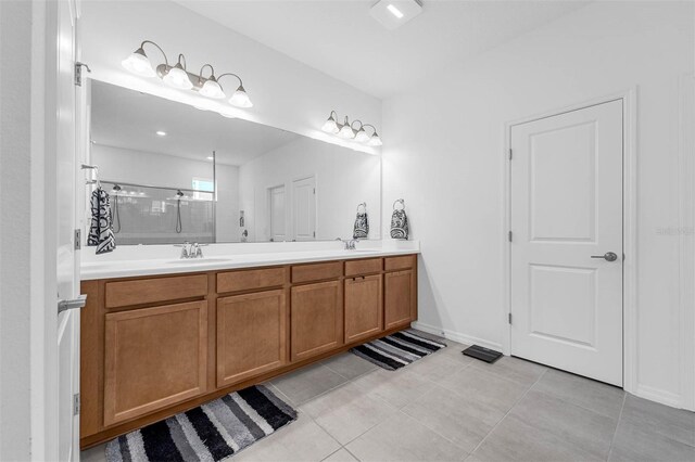 1593 Osprey View Dr, Apopka, FL 32703 - bathroom with double vanity, a shower stall, and tile patterned flooring