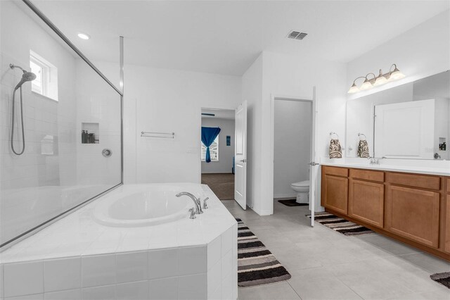 1593 Osprey View Dr, Apopka, FL 32703 - full bath with a garden tub, vanity, a tile shower, and tile patterned flooring