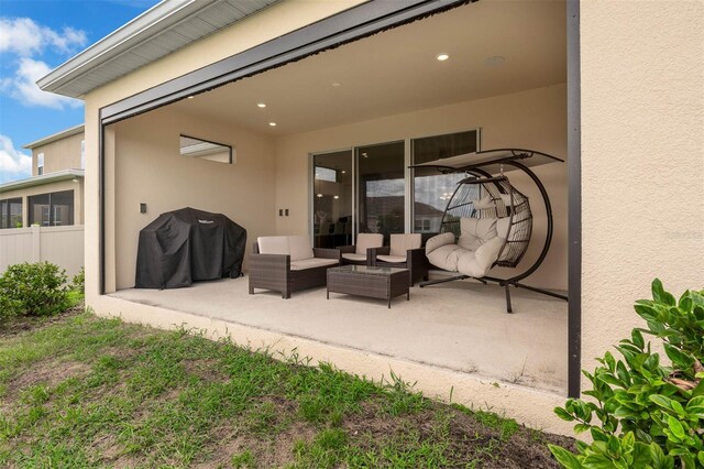 1593 Osprey View Dr, Apopka, FL 32703 - view of patio featuring an outdoor living space and grilling area