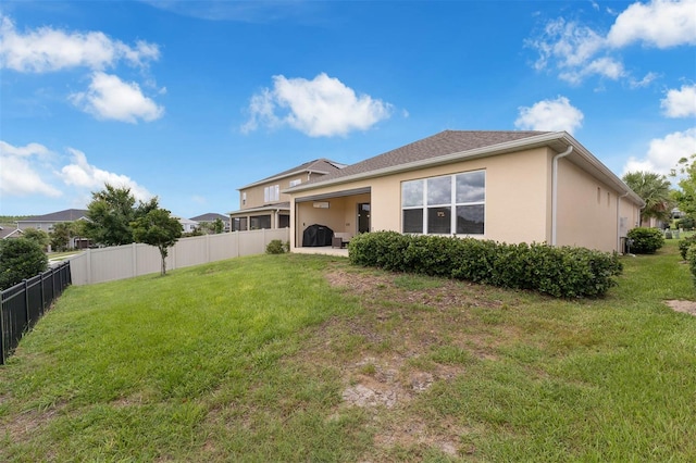 1593 Osprey View Dr, Apopka, FL 32703 - rear view of property featuring stucco siding