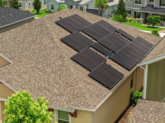 1593 Osprey View Dr, Apopka, FL 32703 - exterior view of roof with shingles, a residential view, and a downspout