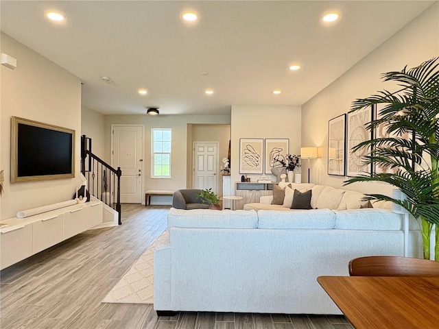 4171 Via Sienna Cir, Sarasota, FL 34243 - living room with stairway, light wood finished floors, and recessed lighting