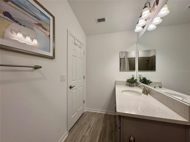 4171 Via Sienna Cir, Sarasota, FL 34243 - full bath featuring vanity and wood finished floors