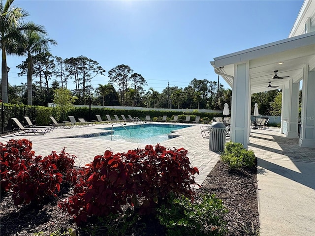4171 Via Sienna Cir, Sarasota, FL 34243 - community pool with a patio and a ceiling fan