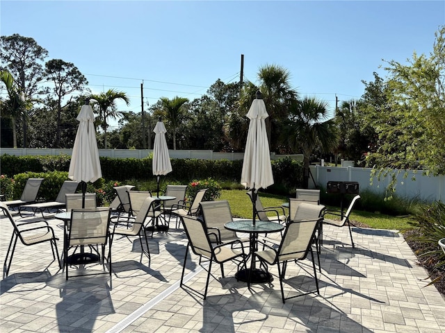 4171 Via Sienna Cir, Sarasota, FL 34243 - view of patio / terrace featuring outdoor dining space