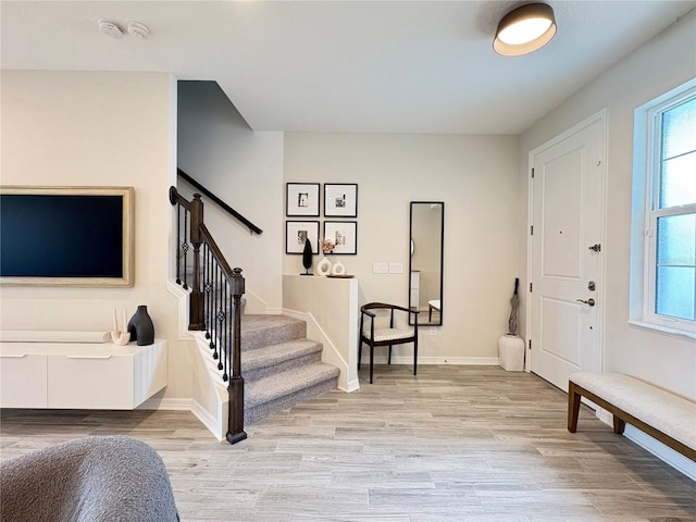 4171 Via Sienna Cir, Sarasota, FL 34243 - foyer entrance featuring light wood-style flooring and stairway
