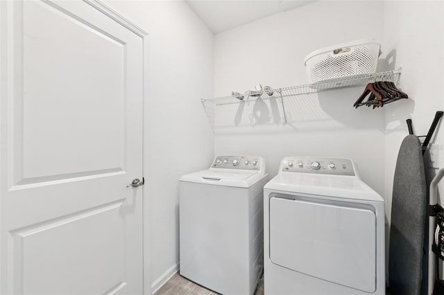 2345 Volunteer Ave, Kissimmee, FL 34744 - laundry room with washer and dryer