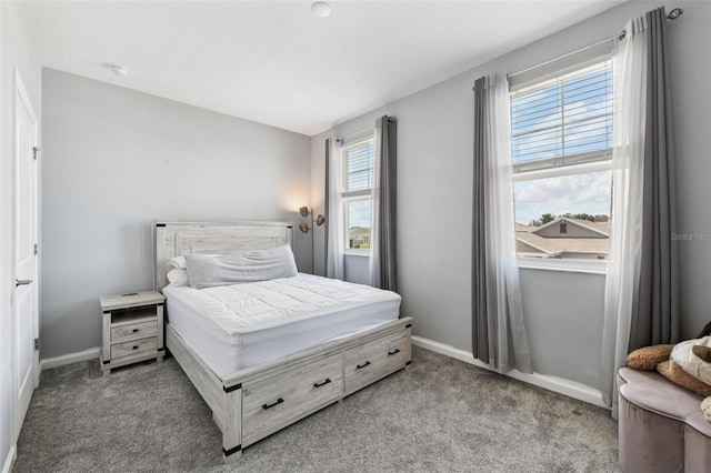 2345 Volunteer Ave, Kissimmee, FL 34744 - carpeted bedroom with baseboards