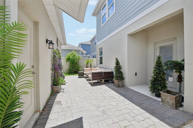 2345 Volunteer Ave, Kissimmee, FL 34744 - view of patio / terrace with an outdoor living space