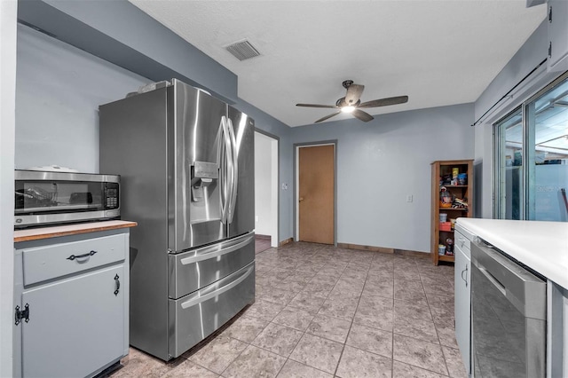 905 Flewelling Ave, Ocoee, FL 34761 - kitchen with appliances with stainless steel finishes and ceiling fan