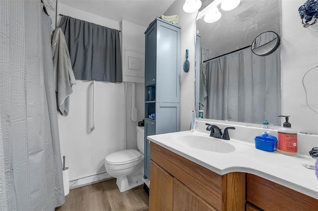 905 Flewelling Ave, Ocoee, FL 34761 - bathroom featuring vanity, wood finished floors, and curtained shower