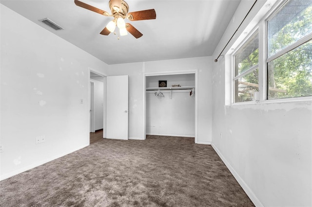 905 Flewelling Ave, Ocoee, FL 34761 - unfurnished bedroom featuring carpet, a closet, and a ceiling fan