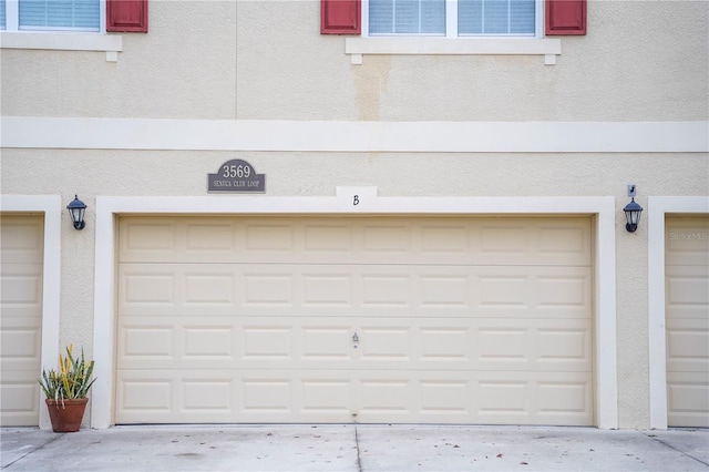 3569 Seneca Club Loop Unit 13, Orlando, FL 32808 - view of garage