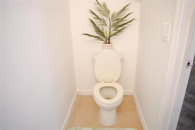 3569 Seneca Club Loop Unit 13, Orlando, FL 32808 - bathroom featuring tile patterned floors and toilet