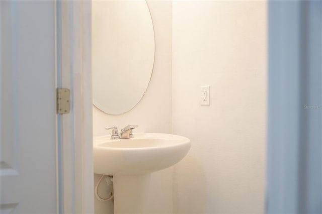 3569 Seneca Club Loop Unit 13, Orlando, FL 32808 - bathroom with a sink