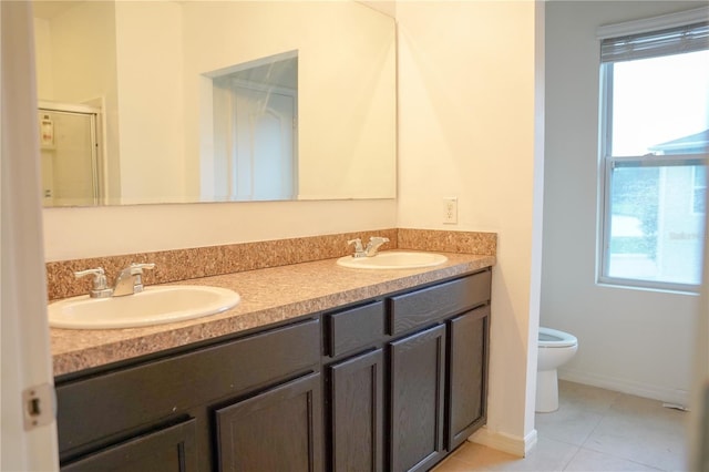 3569 Seneca Club Loop Unit 13, Orlando, FL 32808 - full bath with double vanity, tile patterned floors, and an enclosed shower