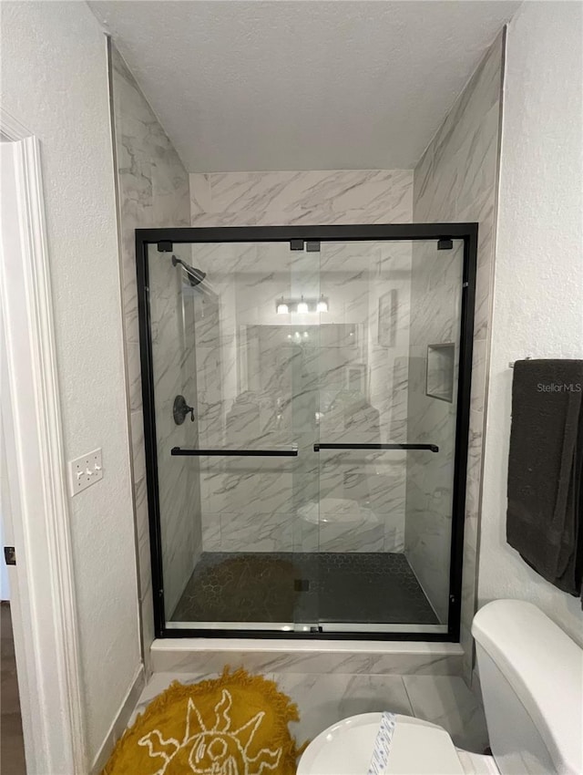 8010 Tuscany Way Unit 3102, Davenport, FL 33896 - bathroom with a textured wall and a stall shower