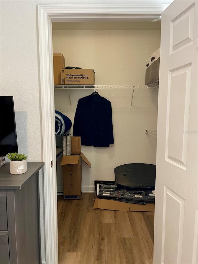 8010 Tuscany Way Unit 3102, Davenport, FL 33896 - walk in closet featuring wood finished floors