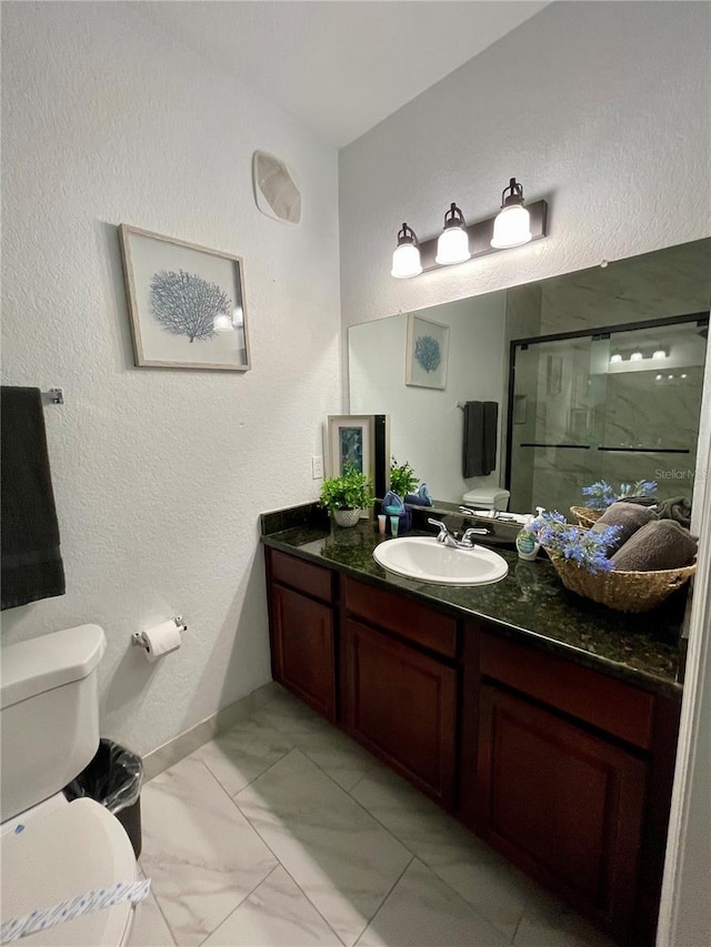 8010 Tuscany Way Unit 3102, Davenport, FL 33896 - bathroom with a shower stall, vanity, and marble look tiles