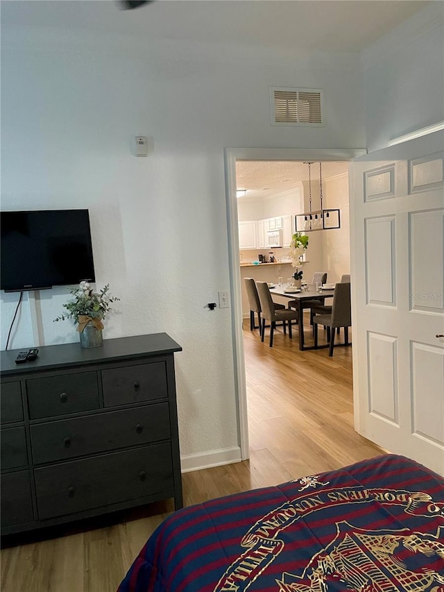 8010 Tuscany Way Unit 3102, Davenport, FL 33896 - bedroom featuring light wood finished floors and baseboards