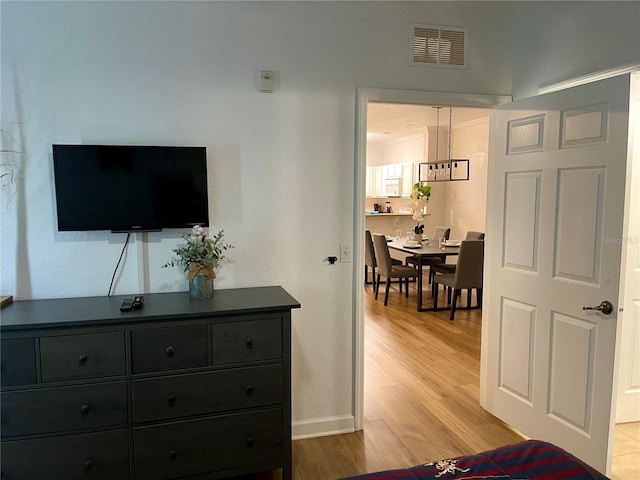 8010 Tuscany Way Unit 3102, Davenport, FL 33896 - living area featuring light wood-style flooring and baseboards